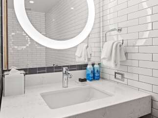 Step into a modern bathroom oasis.