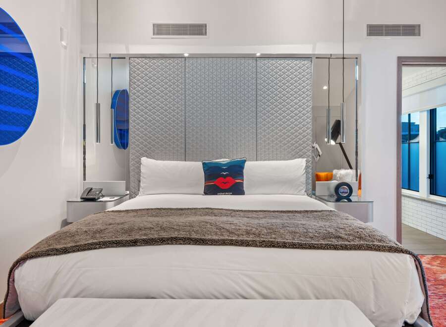 Experience luxury in this stylish hotel room.