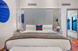 Experience luxury in this stylish hotel room.