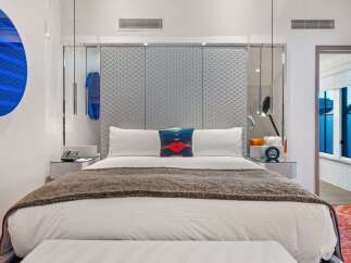 Experience luxury in this stylish hotel room.
