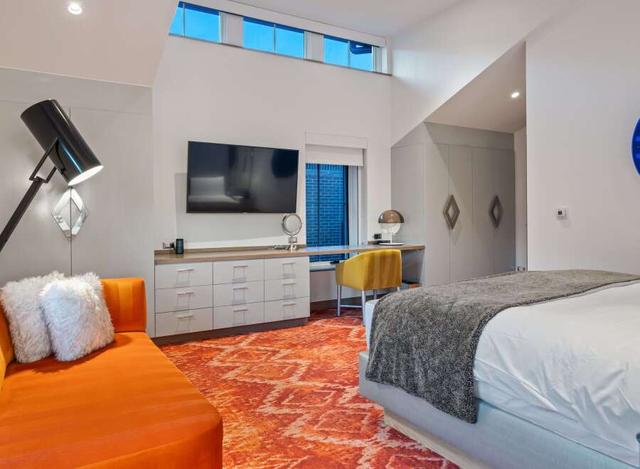 Experience modern luxury in this stylish bedroom.