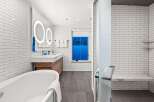 Step into luxury in this stunning bathroom.