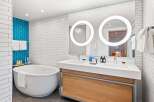 Step into a modern oasis with this stunning bathroom design.