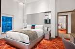 Experience luxury in this stunning hotel room.