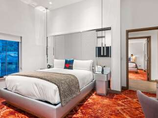 Experience luxury in this stunning hotel room.
