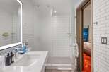 Step into a modern bathroom with sleek design.
