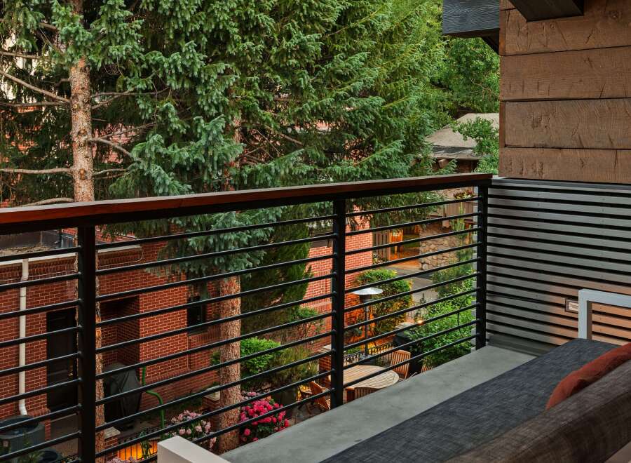 Enjoy the serene views from this stunning balcony, surrounded by lush greenery and a tranquil atmosphere.