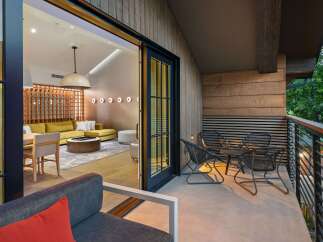 Experience luxury living with this stunning property featuring a spacious balcony perfect for relaxation.