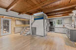 This stunning cabin boasts a spacious open-concept kitchen and living area, perfect for entertaining.