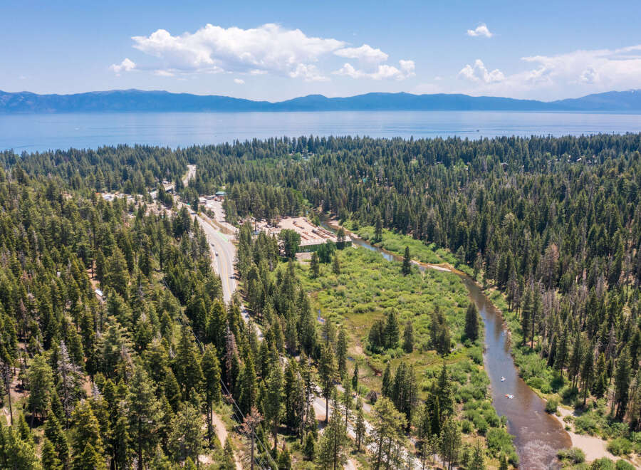 Nestled in a pristine forest, this property boasts stunning views of Lake Tahoe and surrounding mountains.