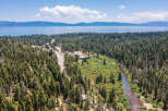 Nestled in a pristine forest, this property boasts stunning views of Lake Tahoe and surrounding mountains.