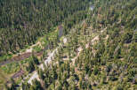 This secluded mountain property boasts stunning views and direct access to a pristine river.
