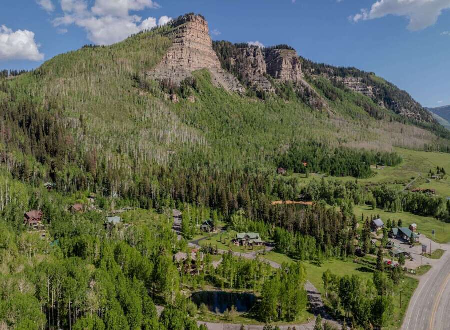 Nestled in the Colorado Rockies, this stunning property boasts breathtaking mountain views and a tranquil setting.