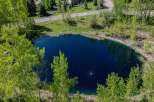 Discover tranquility at this secluded property boasting a stunning private pond.