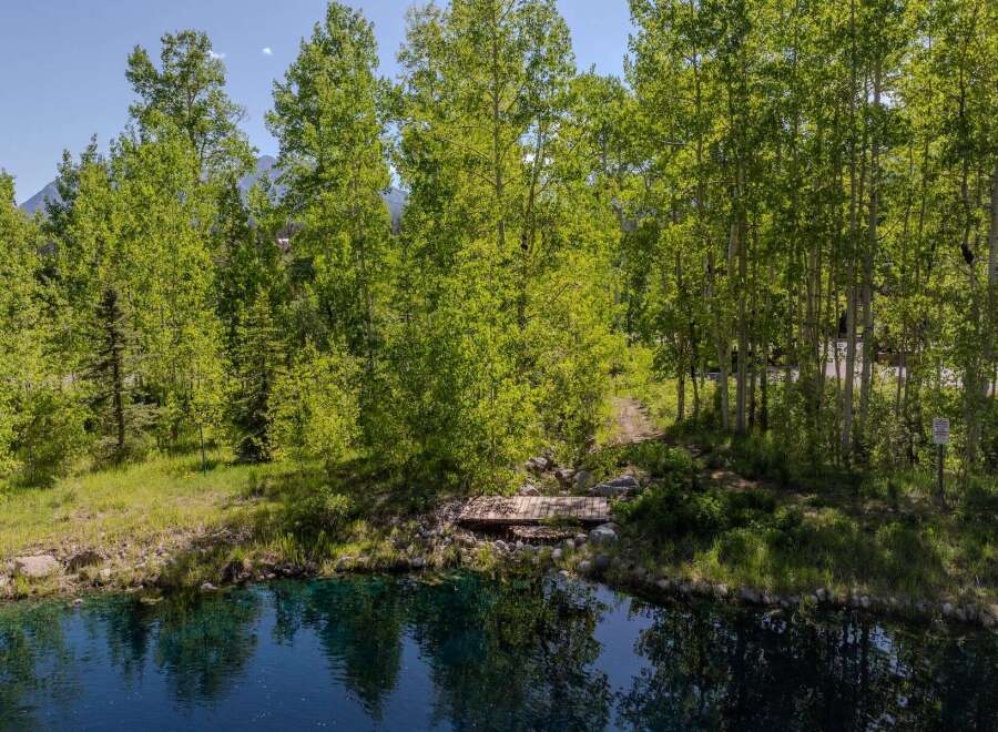 Secluded mountain property with private pond and stunning views.