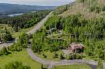 Mountaintop estate with stunning views and private pond.