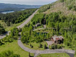 Mountaintop estate with stunning views and private pond.