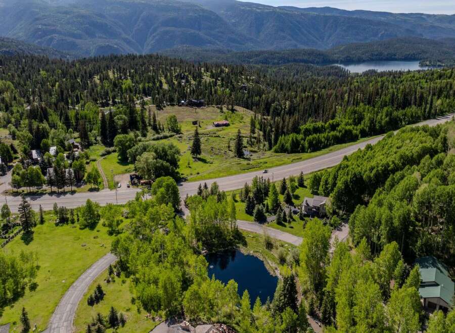 Mountaintop property with stunning views and a private pond.
