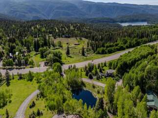 Mountaintop property with stunning views and a private pond.