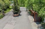 This secluded property boasts a private gated entrance, ensuring privacy and security.