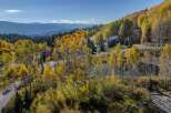 Nestled amidst the vibrant hues of autumn, this stunning property offers a serene escape.