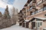 This stunning ski resort property boasts multiple floors of spacious rooms, each with its own private balcony offering breathtaking views.