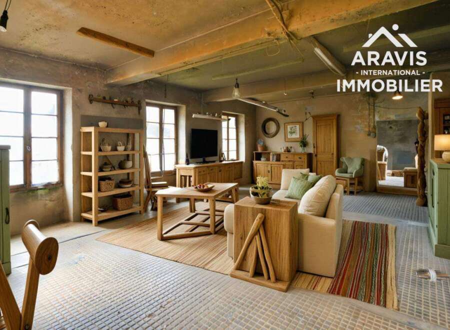 Rustic-chic living space with exposed beams and large windows.