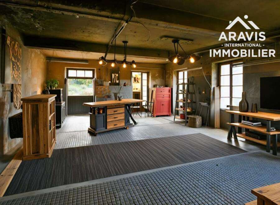 Stunning industrial-style loft conversion boasting high ceilings, exposed brickwork, and large windows.