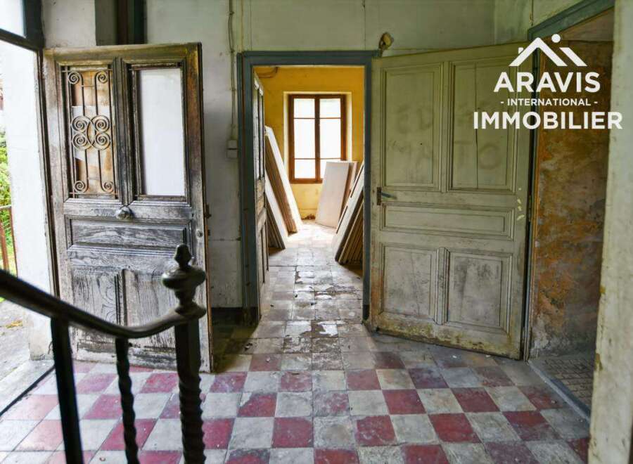 Discover this unique property featuring antique doors, high ceilings, and original flooring.