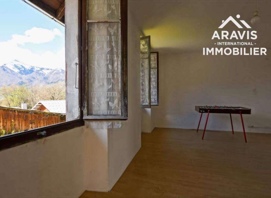 Mountain view room with vintage charm.