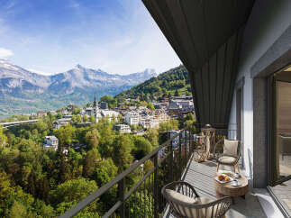 Experience breathtaking mountain views from this stunning property.