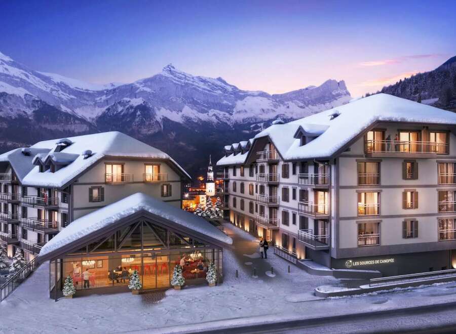Discover the charm of Les Sources de Canopée, a stunning property nestled in a picturesque winter wonderland.