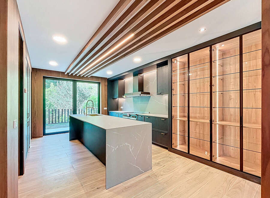 Step into luxury with this stunning kitchen design.