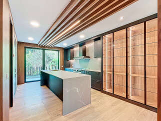 Step into luxury with this stunning kitchen design.