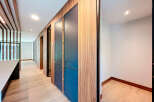 Explore the elegant design of this property, featuring stunning wooden accents and a modern aesthetic.