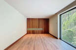 Discover a modern interior with a stunning wooden accent wall.