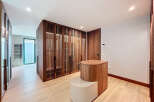 Step into luxury with this stunning property featuring exquisite wooden accents and a modern design.