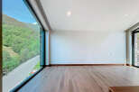Discover a stunning property with breathtaking views of lush green mountains.