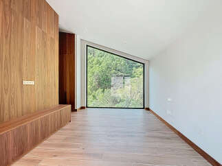 This stunning property boasts a unique architectural design with a modern interior.