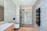 Step into a modern bathroom oasis.