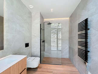 Step into a modern bathroom oasis.