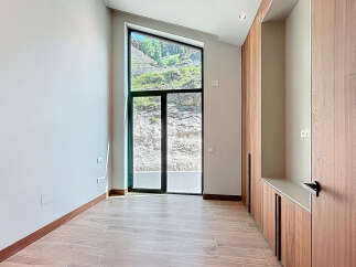 Discover a modern interior with a unique window design.