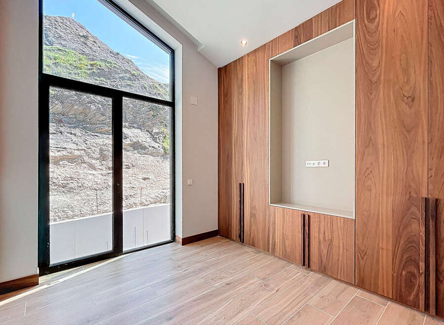 Discover a modern interior with stunning mountain views.