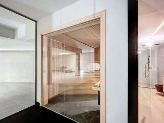 Step into luxury with this stunning property featuring a modern sauna, perfect for relaxation and rejuvenation.
