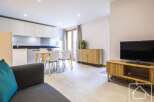 Discover modern living in this stylish apartment, featuring a bright and airy open-plan layout.