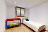 Discover this charming bedroom, perfect for a cozy retreat.