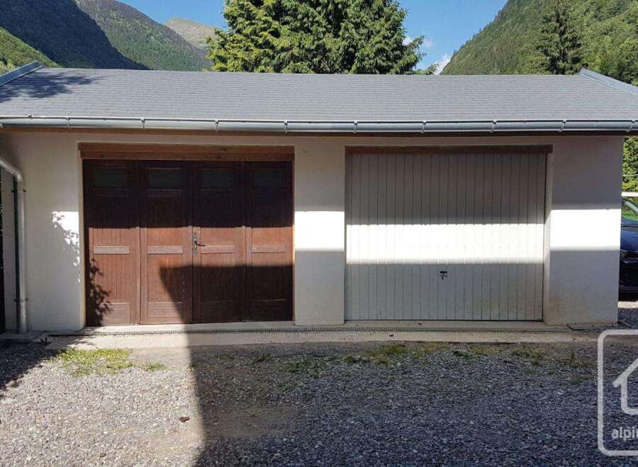 Discover this charming property featuring a two-car garage, perfect for storing vehicles or creating a workshop.