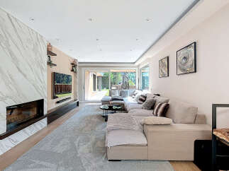 Experience luxury living in this stunning property, featuring a modern interior design.