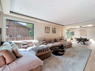 Experience luxury living in this stunning property, featuring a spacious open-plan layout perfect for entertaining.