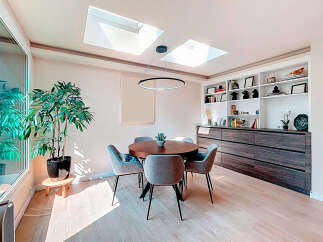 This stunning dining room boasts a modern design with a touch of elegance.
